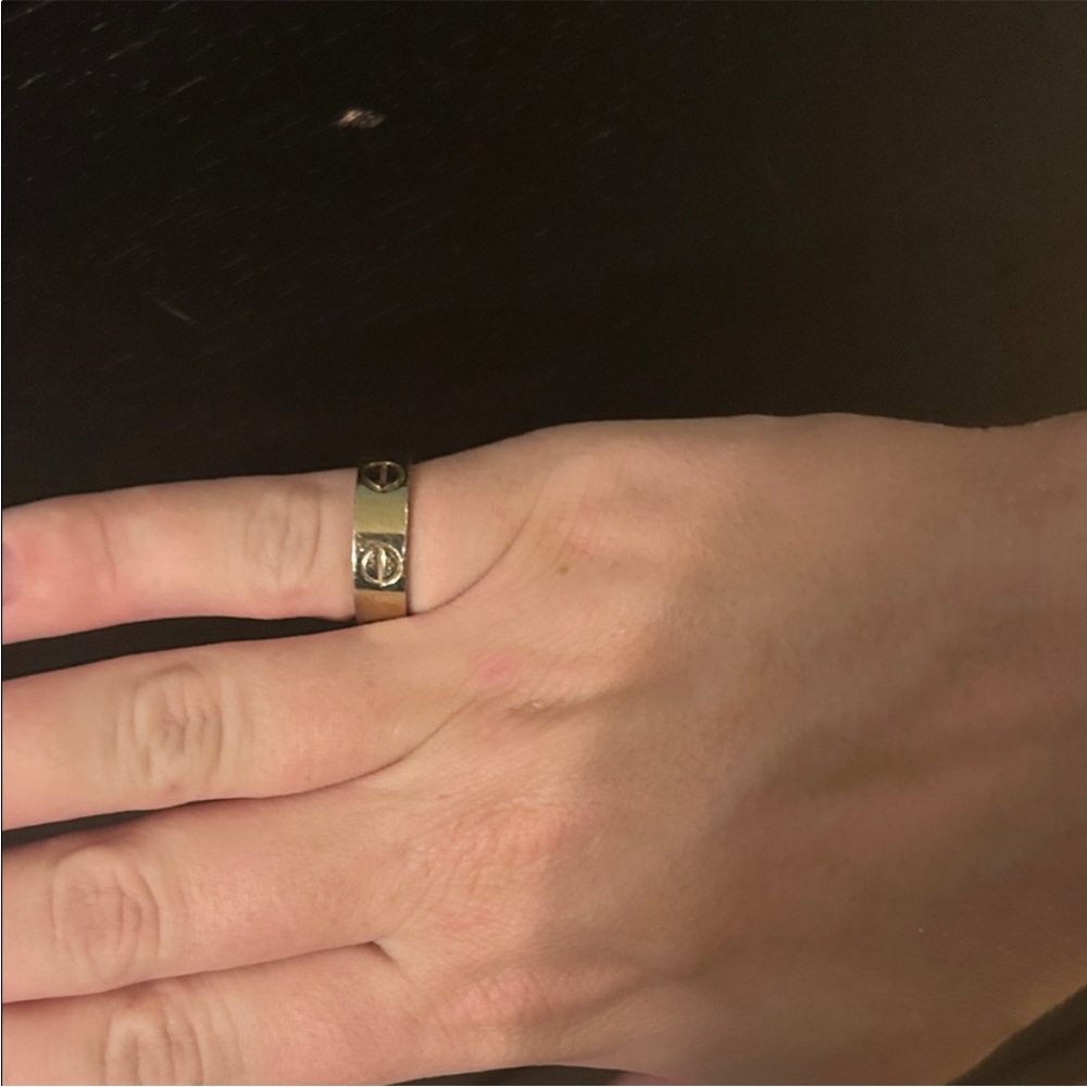 Cartier Gold Love Ring with Engraved Details